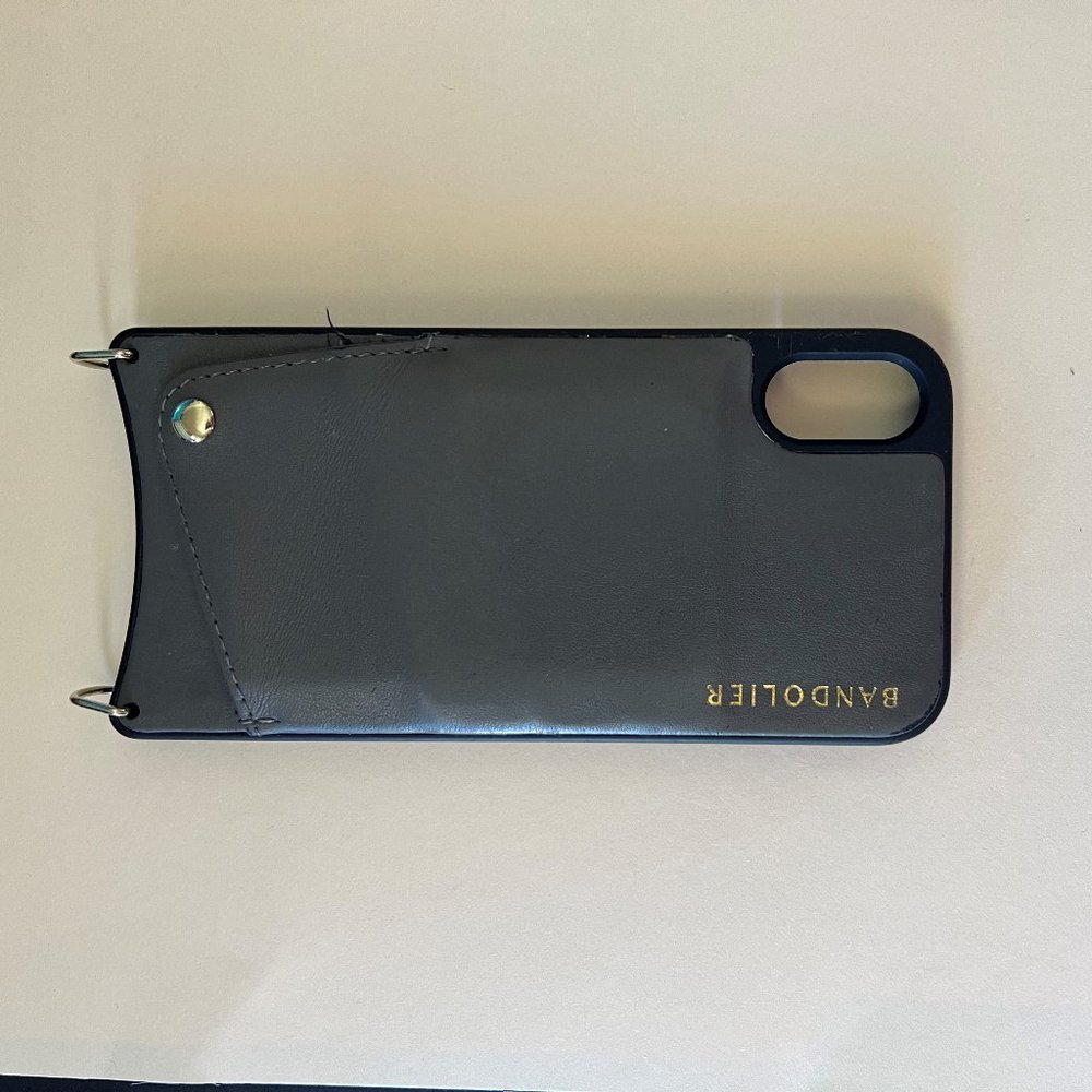 Bandolier iPhone XR Case in smooth gray leather with gold hardware. No strap.